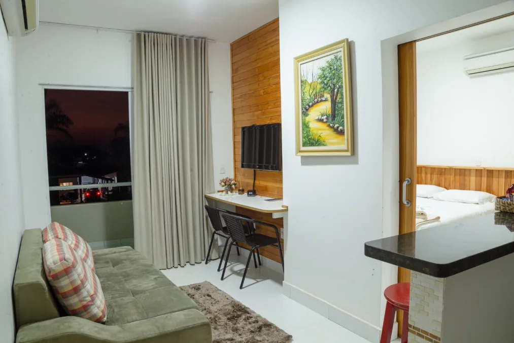 Flat 3 com cama e varanda com rede